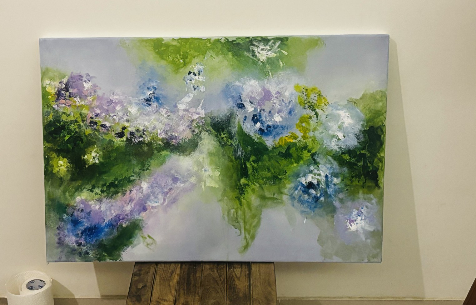 A finished floral painting in the studio